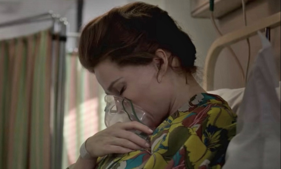 Margaret, portrayed by actress Helena Bonham Carter, clutches an oxygen mask in The Crown's fourth season