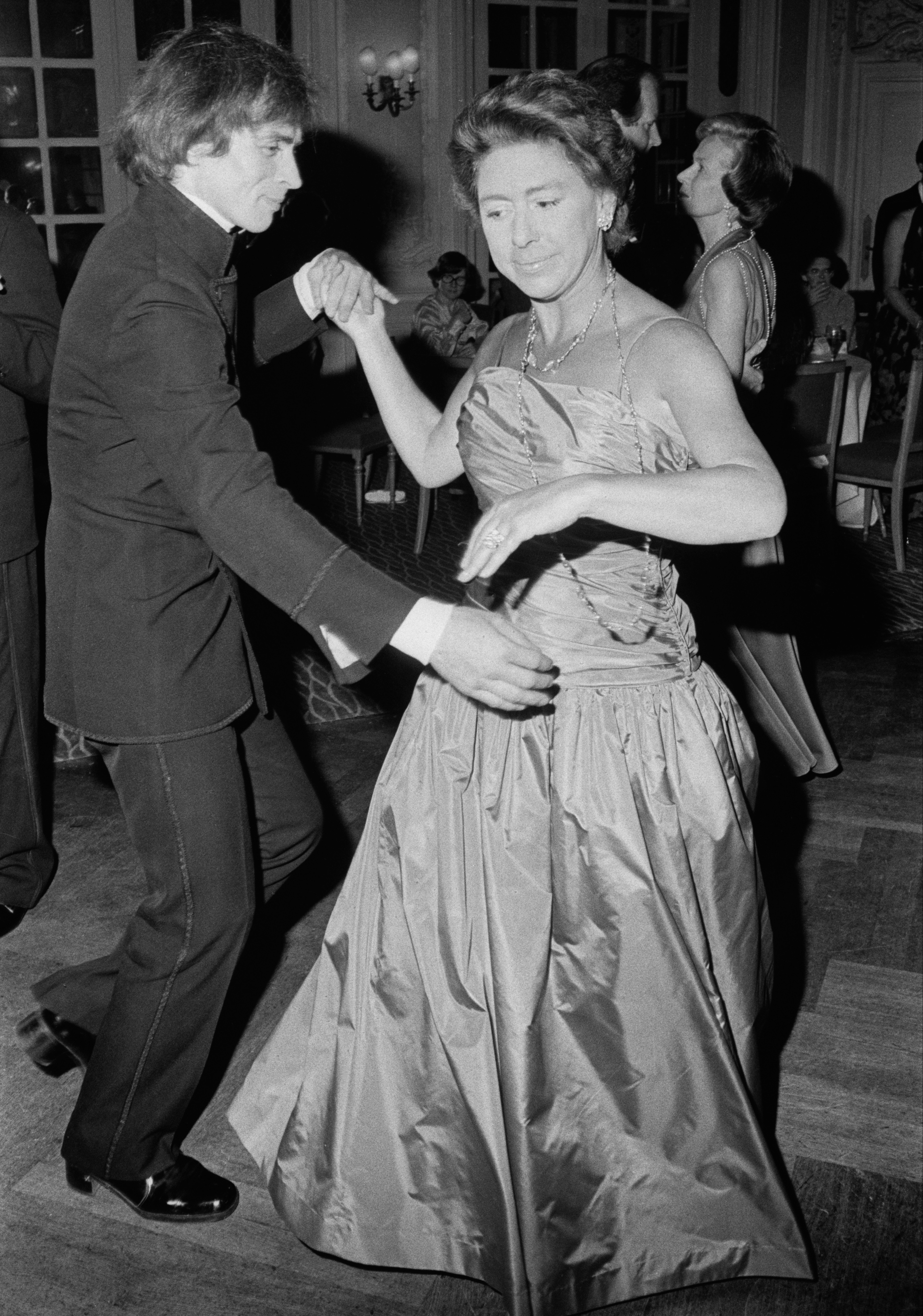 Margaret dances with ballet star Rudolf Nureyev at a party in June 1977