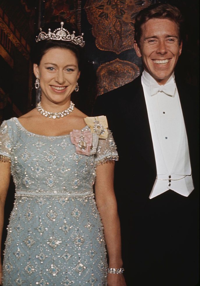 She smiles beside Lord Snowdon during an official royal engagement